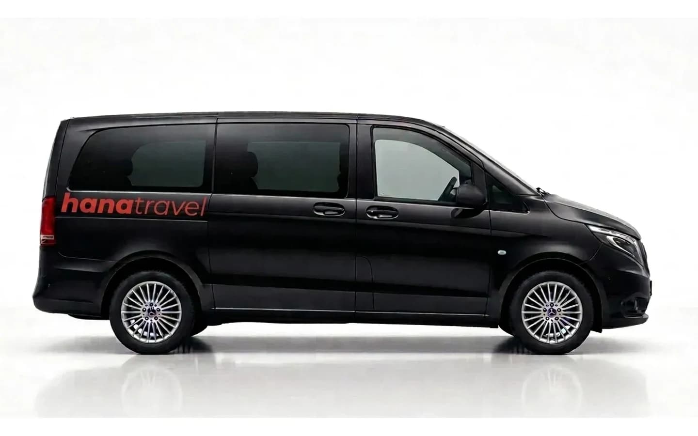 Side profile of a black Mercedes-Benz Vito on a white background for Antalya Airport transfers.