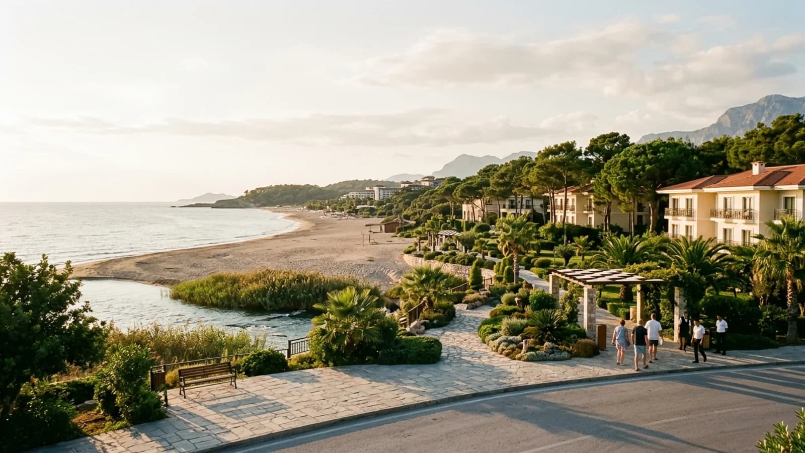 Boğazkent river mouth and beach resort The Köprüçay river mouth meets the sea at Boğazkent beach, lined with reeds and distant resort hotels.